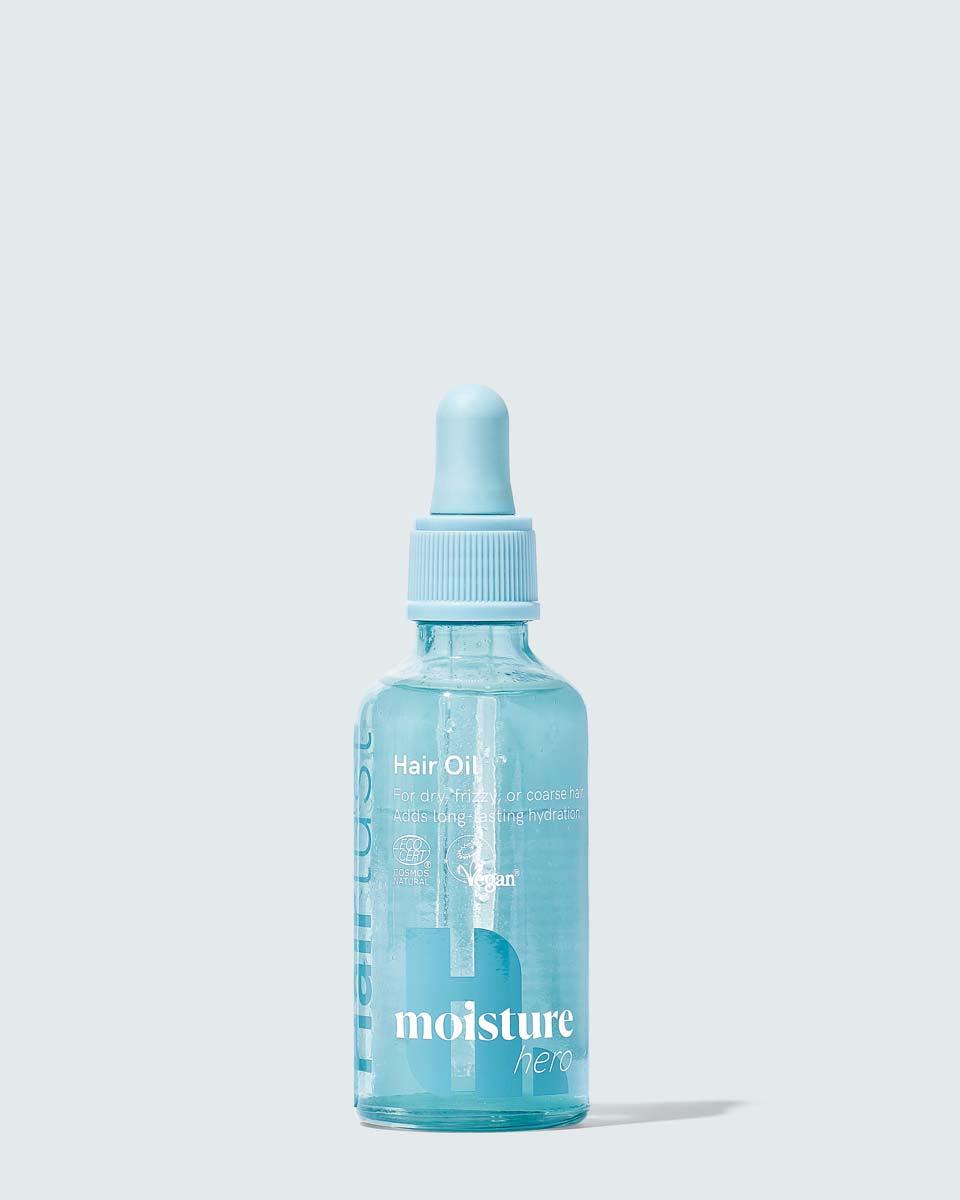 Hairlust Moisture Hero Hair Oil i liten brun glassflaske