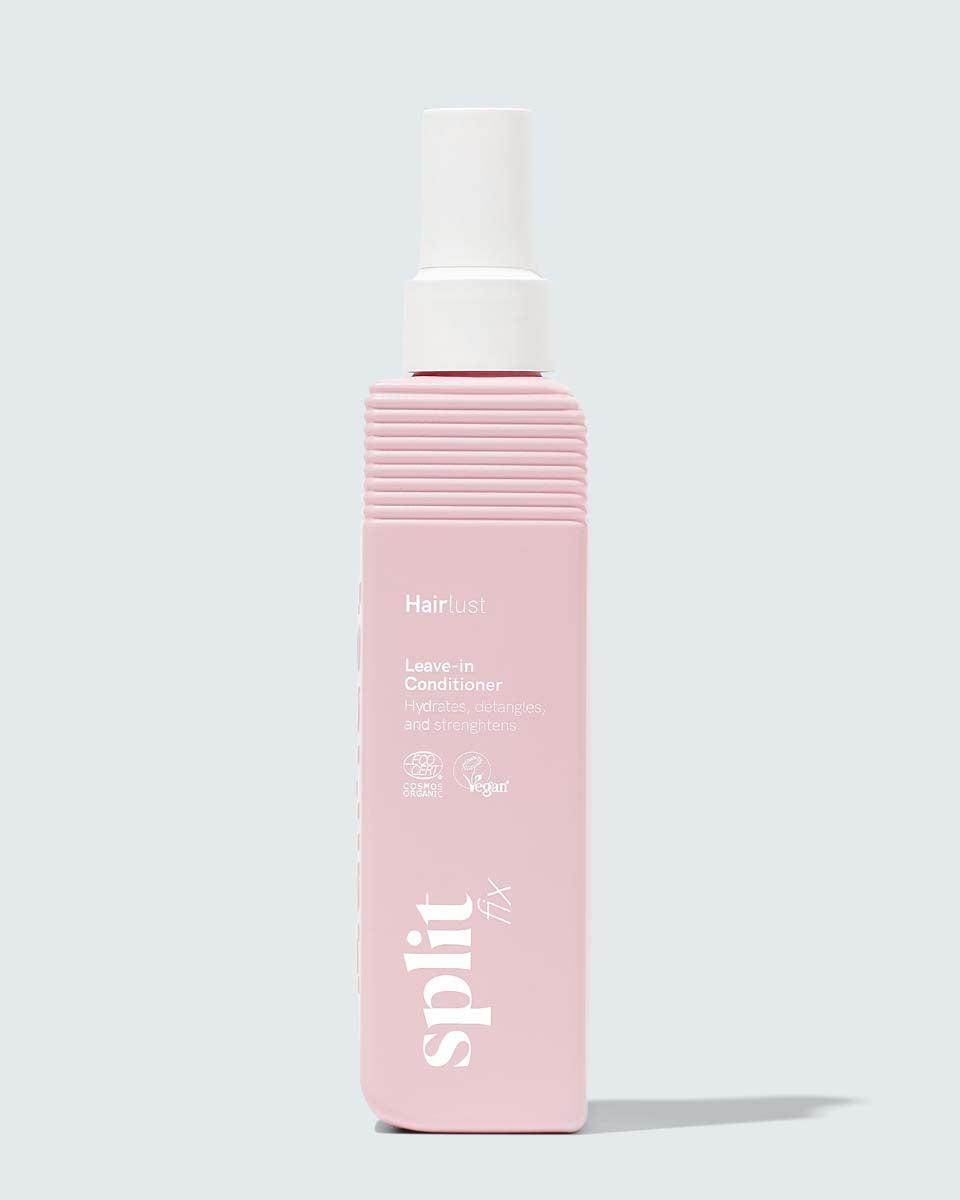 Hairlust Split Fix Leave-in Conditioner i lilla og hvit pumpeflaske