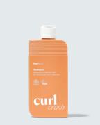 Hairlust Curl Crush Shampoo flaske i hvit og turkis design