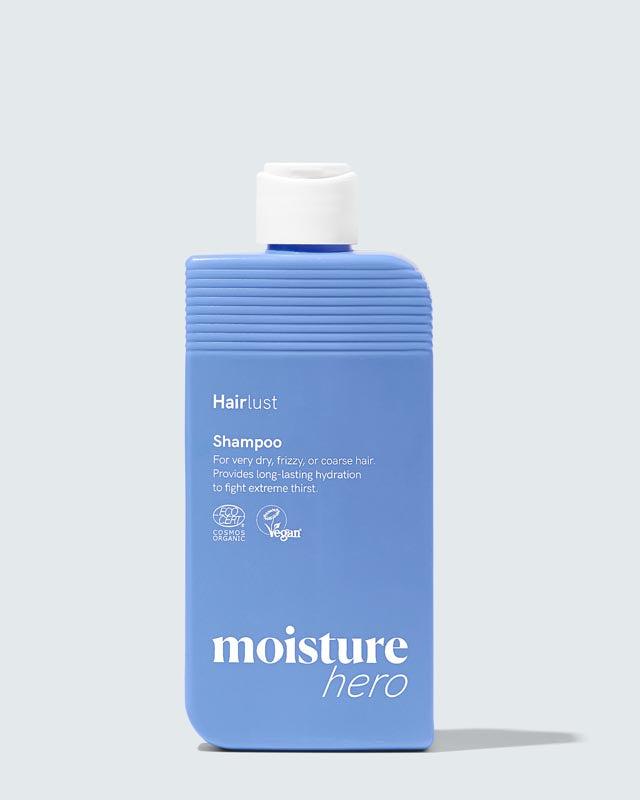 Hairlust Moisture Hero Shampoo flaske mot hvit bakgrunn